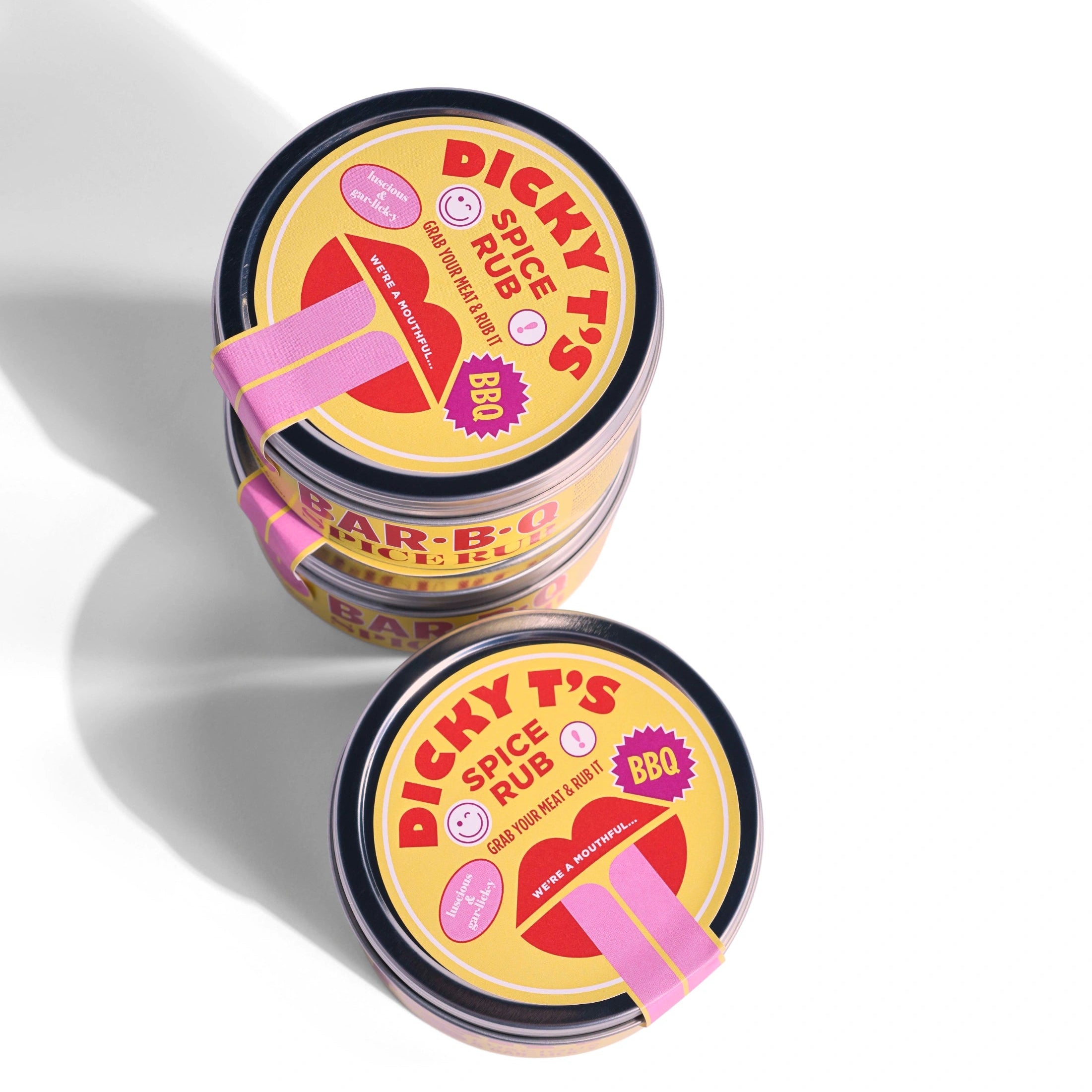 Two jars of Dicky t's bbq Spice rub on a white background